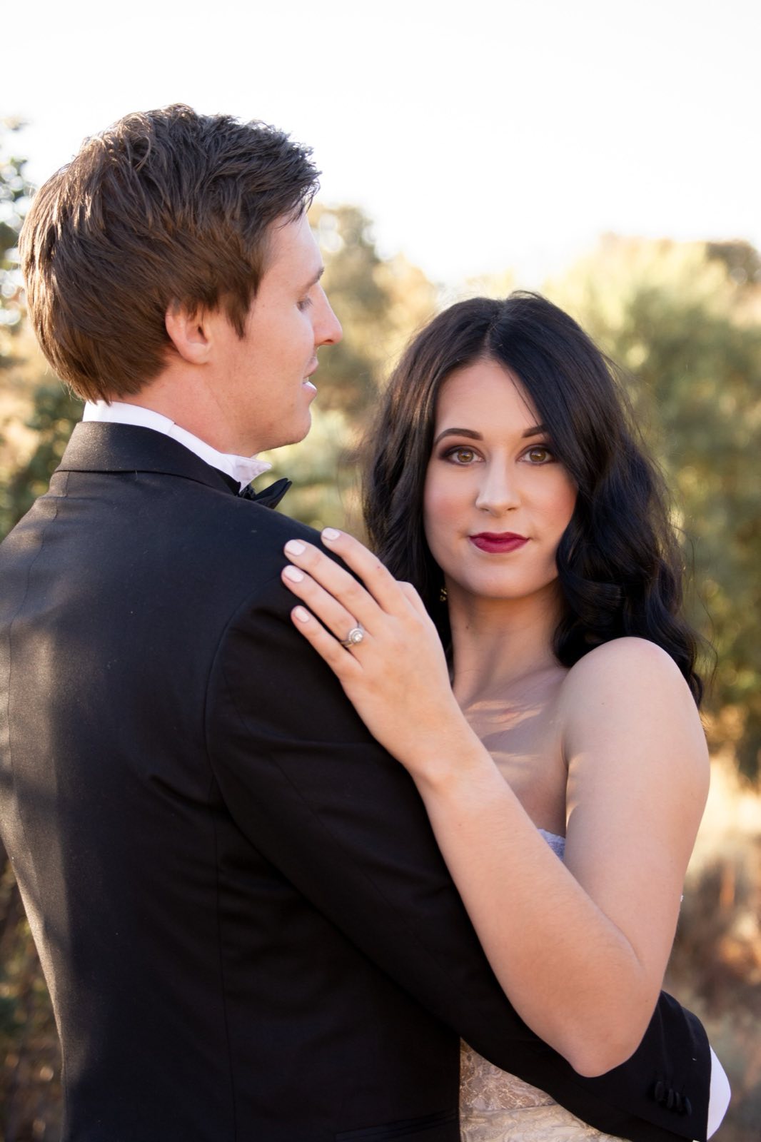 Couple sharing a quiet portrait in warm evening light